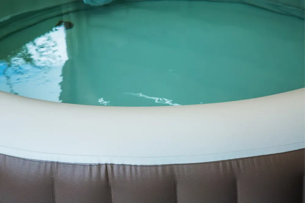 close up of inflatable hot tub filled with water